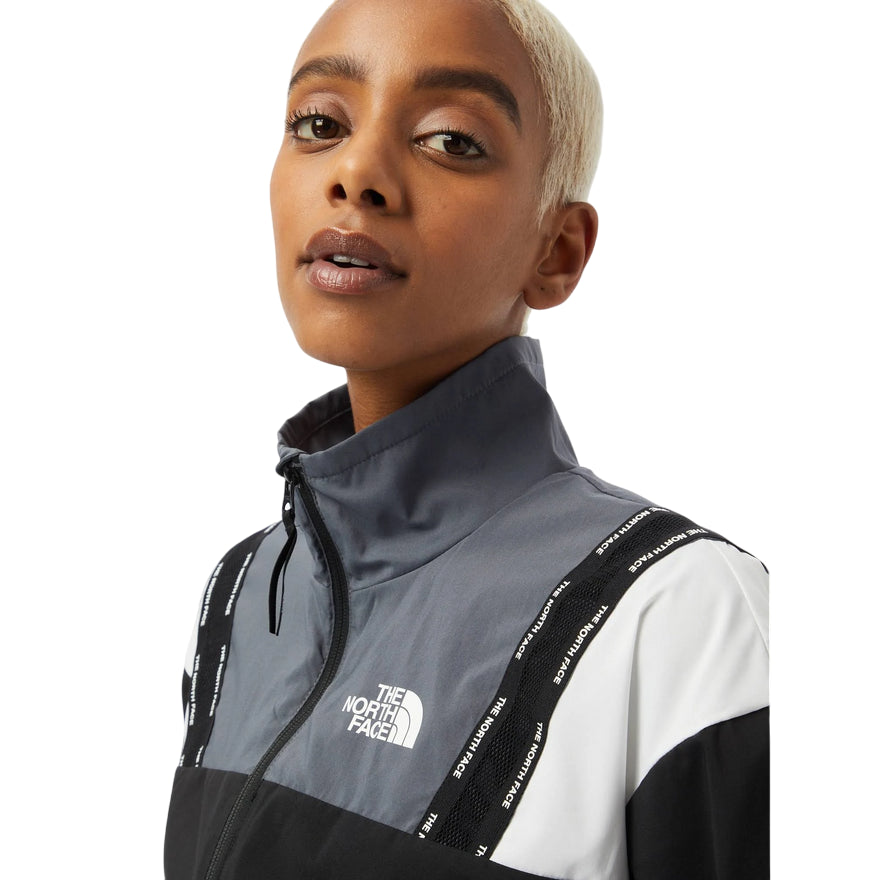 The North Face W Train N LOgo Wind Jacket NF0A5563NY71 black vanadis grey