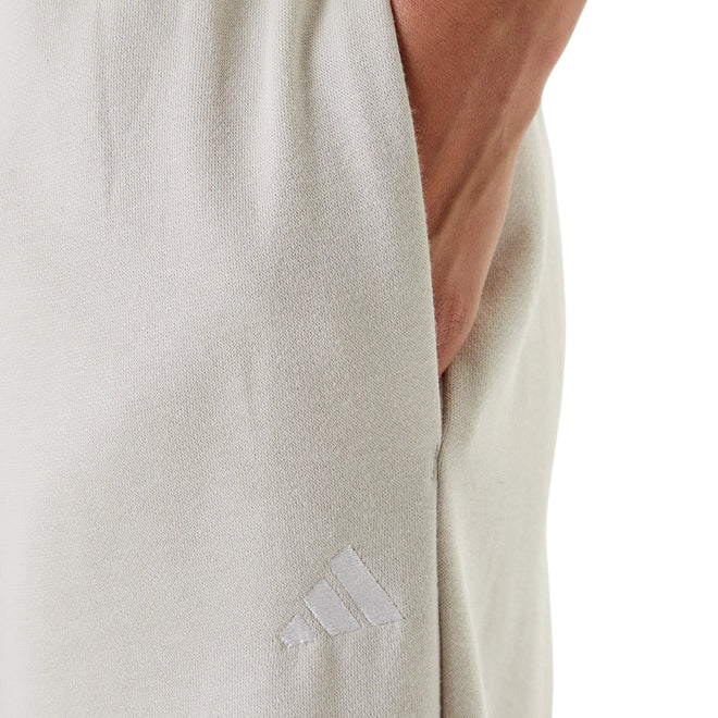 Adidas Pantaloni da donna Essentials Small Logo JC5922 Beige - tasca e logo ricamato 