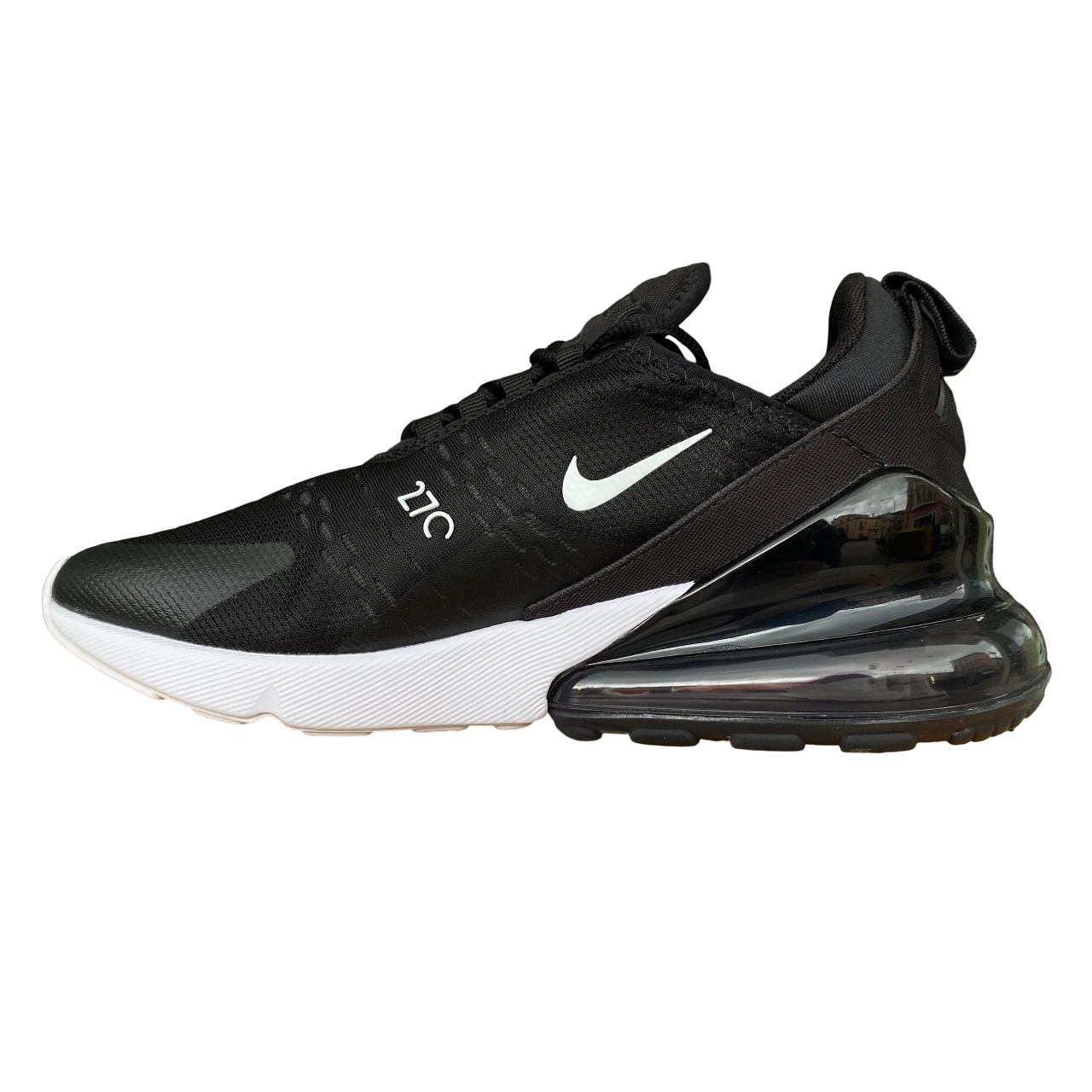Nike Air Max 270 nero-bianche da uomo modello AH8050-002 con unità Air visibile, design moderno e ammortizzazione superiore per uso quotidiano e sportivo - interno