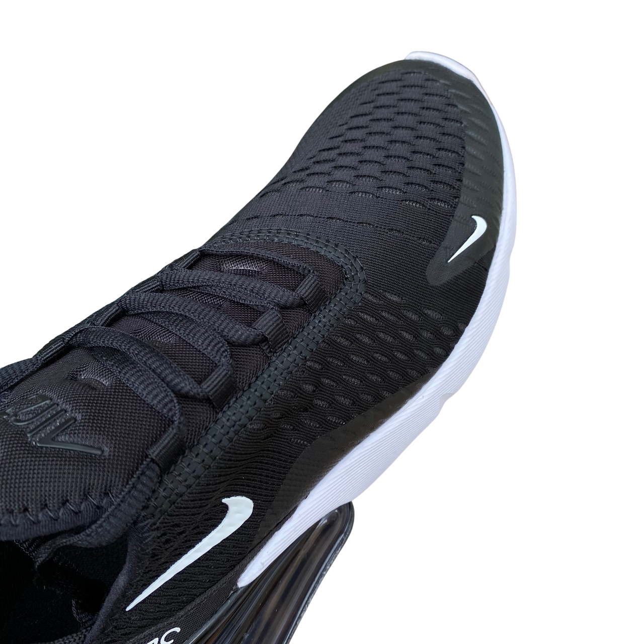 Nike Air Max 270 nero-bianche da uomo modello AH8050-002 con unità Air visibile, design moderno e ammortizzazione superiore per uso quotidiano e sportivo - punta