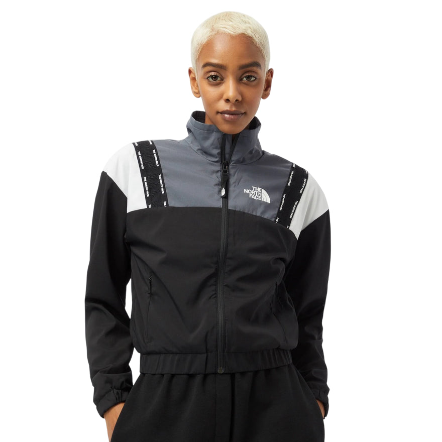 The North Face W Train N LOgo Wind Jacket NF0A5563NY71 black vanadis grey